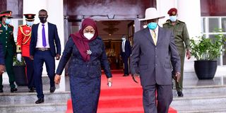 Ugandan President Yoweri Museveni and Tanzanian President Samia Suluhu Hassan.