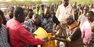 Turkana Governor Jeremiah Lomorukai kicking off relief food distribution programme for Turkana East