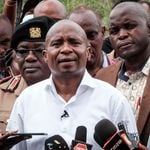 Interior Cabinet Secretary Kithure Kindiki (centre) speaks after visiting the mass-grave site in Shakahola
