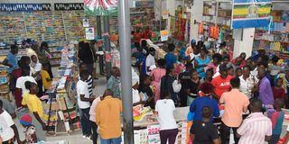 Customers do last-minute school shopping at Veghela Bookshop in Kakamega town