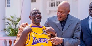 President William Ruto receives a Los Angeles Lakers jersey from five-time NBA champion Ron Harper 