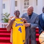 President William Ruto receives a Los Angeles Lakers jersey from five-time NBA champion Ron Harper 