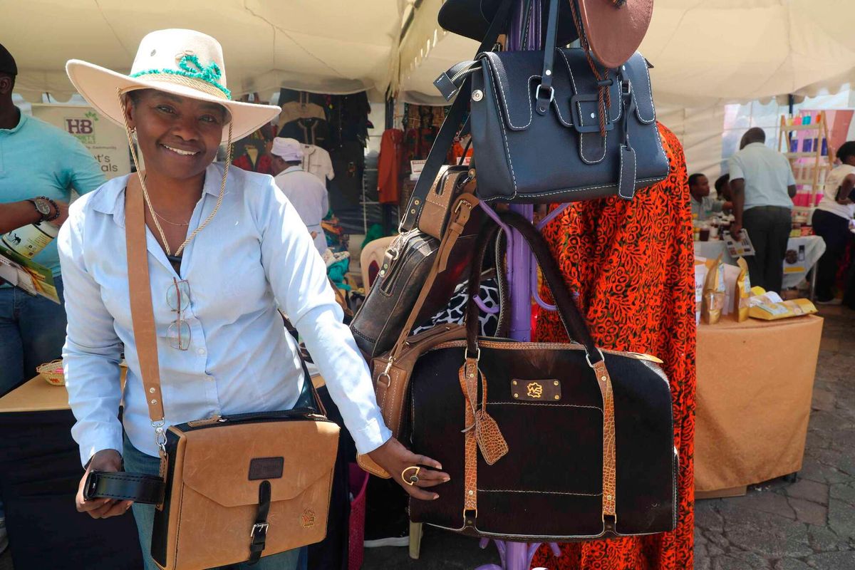 She quit a 30-year banking career to make leather bags